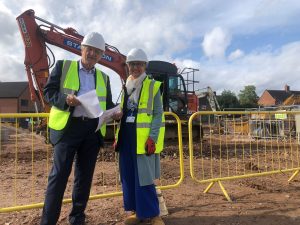 Cllr Ian Courts (Leader of Solihull Council) and Fiona Hughes (Chief Executive of Solihull Community Housing) at the Montfort site as building work begins.